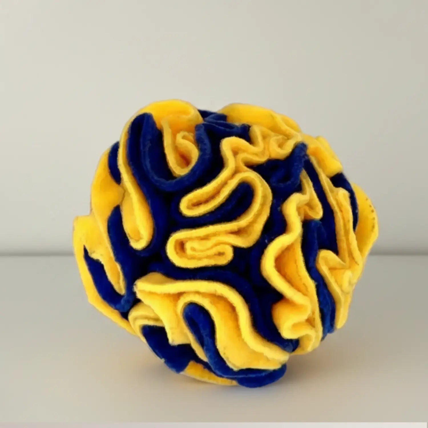 Royal blue and yellow anti-pill fleece snuffle ball for dogs, handmade in the UK, ideal for mental stimulation and foraging