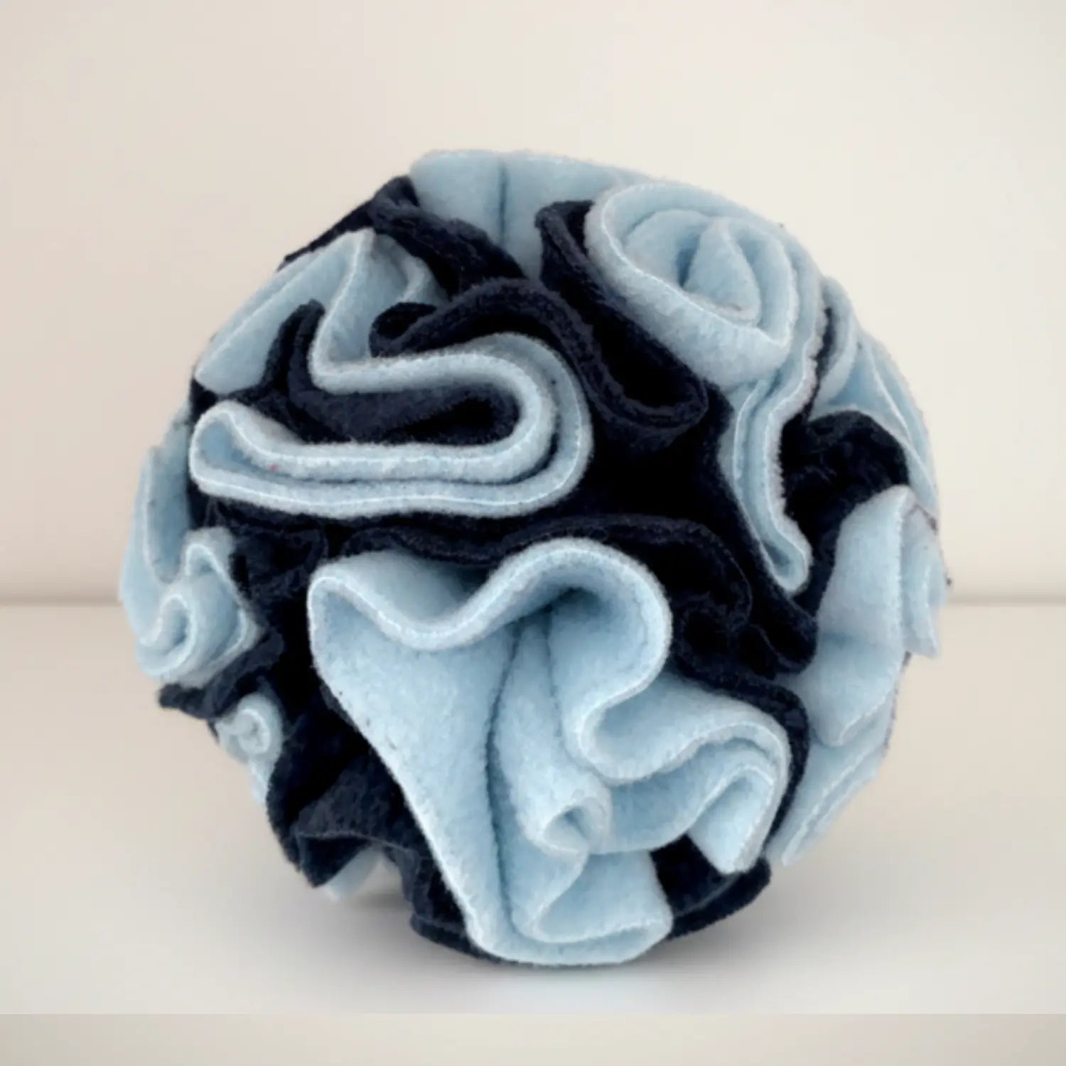 Handmade pale blue and navy fleece snuffle ball dog enrichment toy by Pawsome Pets At Home