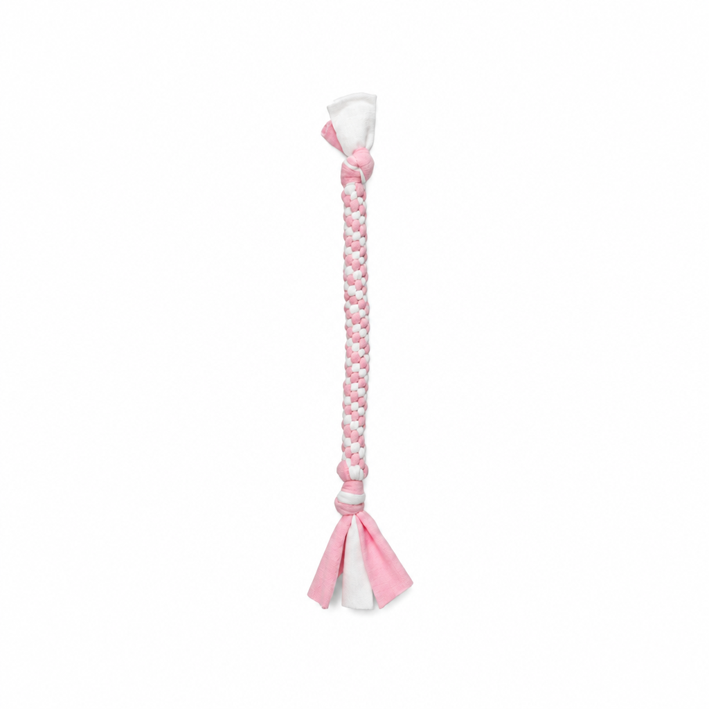 Handmade baby pink and 
white woven fleece dog tug toy 