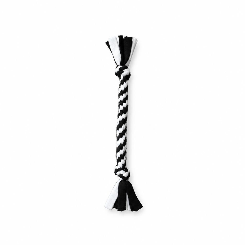 Handmade black and white  woven fleece dog tug toy 
