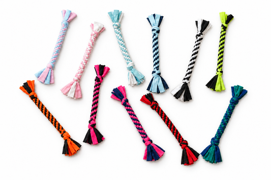 Handmade Colourful fleece woven tug toys arranged on a white background