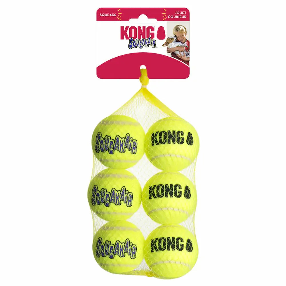 Pack of six yellow KONG Squeak balls with packaging Medium UK